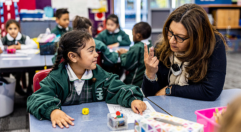 Teacher with student at Good Shepherd Catholic Primary Plumpton