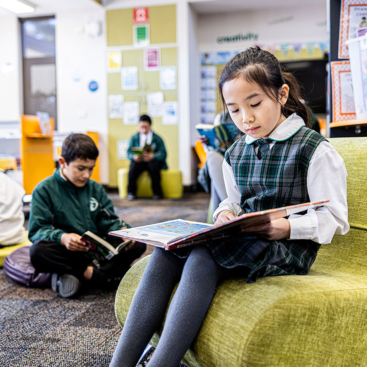 Students reading in Good Shepherd Catholic Primary Plumpton school library