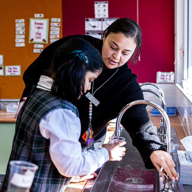 Teacher with student at Good Shepherd Catholic Primary Plumpton